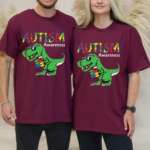Ausome Dino Colorful Autism Tee Cute Dinosaur Graphic Shirt.png