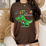 Ausome Dino Colorful Autism Tee Cute Dinosaur Graphic Shirt.png
