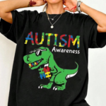 Ausome Dino Colorful Autism Tee Cute Dinosaur Graphic Shirt.png